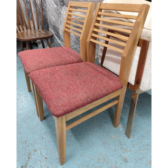 2  solid wood dining chairs (75% new)