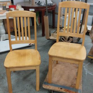 Four solid wood dining chairs (70% new)