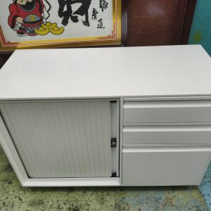 Three-foot-long metal filing cabinet (75% new)