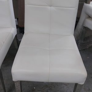 Stainless steel dining chair with leather legs (70% new) - Dimensions: 45cm (width) * 51cm (depth) * 90cm (height)